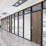 Why do offices use glass walls?