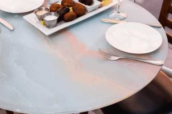 How can you tell if a glass table top is tempered?
